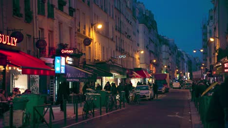 Stores-and-restaurants-on-rue-Saint-Denis,-in-the-10th-arrondissement-of-the-French-capital,-Paris