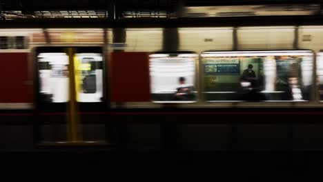 Metro-Arrives-at-Station,-Few-People-Are-Wating,-Public-Transportation-Concept,Osaka,-Japan