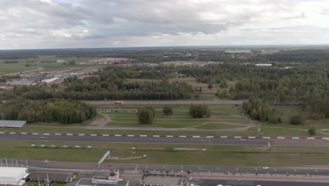 Wide-majestic-aerial-tilt-down-revealing-race-track-Mantorp-Park