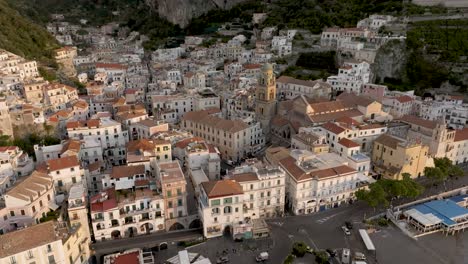 Amalfi,-Italy-at-sunrise-with-drone-video-spinning-shot-of-city