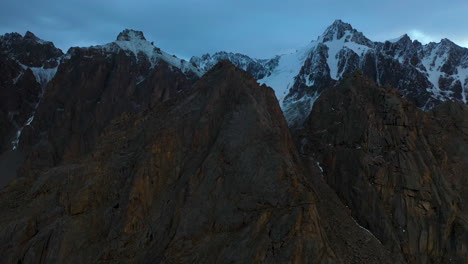 Rotating-drone-shot-of-a-peak-on-the-Ak-Sai-glacier-in-Kyrgyzstan