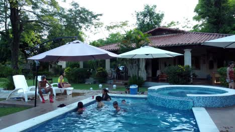 Family-enjoying-their-day-at-the-pool