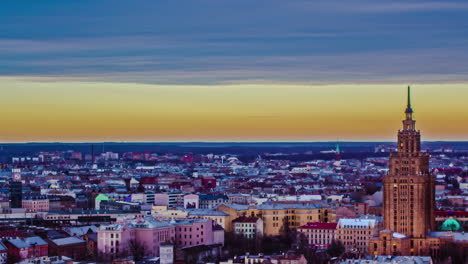 Riga-city-skyline-and-tower-with-vibrant-sky,-fusion-time-lapse