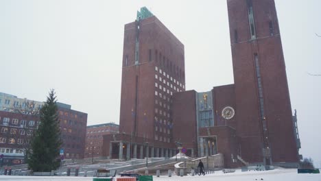 Oslo-Radhus-Entrance-View-From-Fridtjof-Nansens-Square-On-Overcast-Snowy-Day