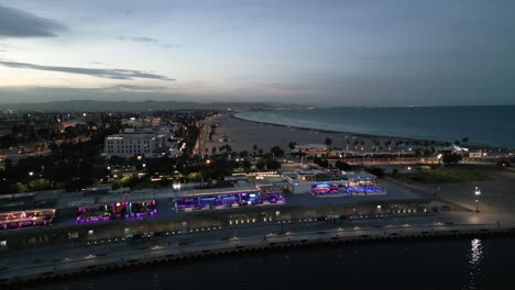 Sunset-Drone-Shot-of-the-Clubs-by-the-Waterfront-in-Valencia
