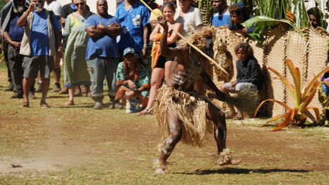 Dancer-performs-ceremonial-dance-honoring-new-Isle-of-Pines-chief,-48-fps