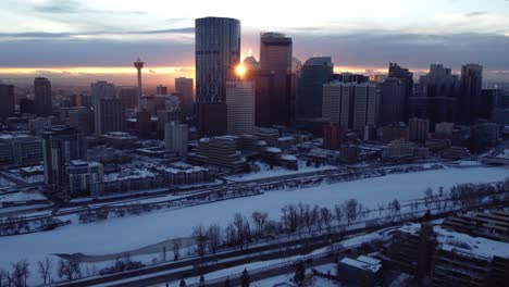 Winter-sunset-drone-footage-of-Calgary's-downtown