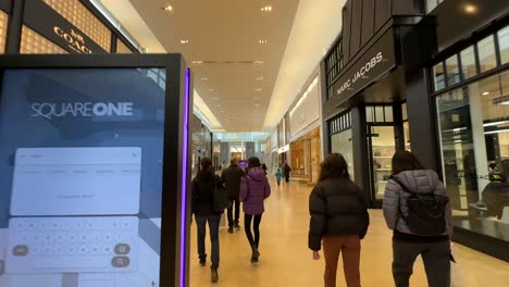 Walking-through-interior-of-Square-One-shopping-mall-in-Mississauga,-Ontario