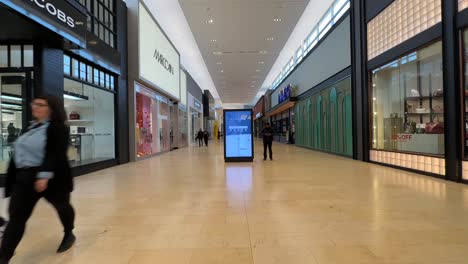 Square-One-mall,-Mississauga-Ontario,-interior-hall-stores-and-digital-directory