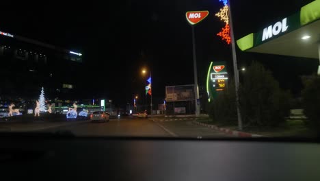 Car-Enter-At-Gas-Station-At-Night