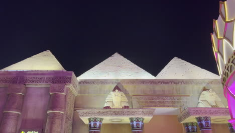 Egypt-pyramids-replica-at-Global-Village-Dubai-seen-at-night-with-pharaoh-bust-at-the-entrance