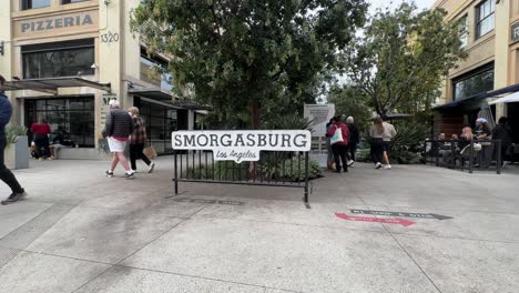 Entrance-to-the-open-air-food-trucks-and-vendors-at-Smorgasburg,-Downtown-Los-Angles-California