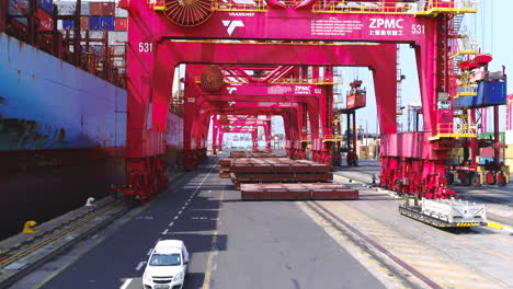 Drone-along-a-Gantry-crane-busy-loading-a-cargo-container-ship-with-containers