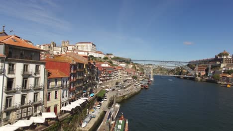 Porto-with-Famous-Dom-Luis-I-Bridge,-River-Douro-and-Ribeira-Houses-Aerial-View