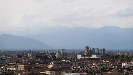 Pan-across-Turin-skyline-in-Italy-stopping-at-Mole-Antonelliana