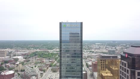 Aerial-view-towards-modern-blue-Regions-tower-downtown-skyscraper-on-Indianapolis-cityscape