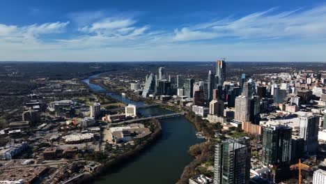 Aerial-view-away-from-downton-Austin,-fall-day-in-USA---pull-back,-drone-shot