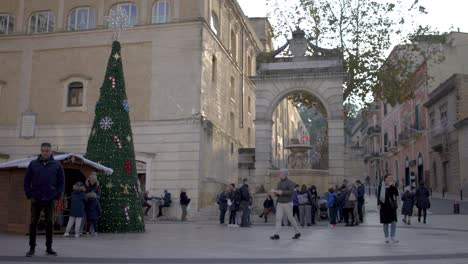 Matera,-Italy-market-during-Christmas-with-people-walking-around