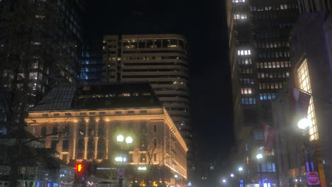 Illuminated-Modern-Cityscape-Center-At-Night-In-Boston,-Massachusetts,-United-States