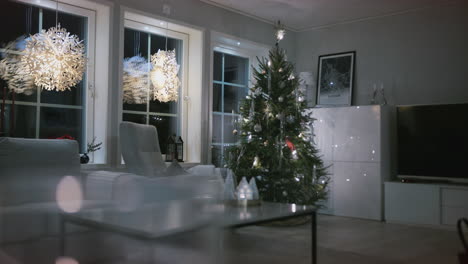 Dolly-shot-of-Beautiful-decorated-Christmas-tree-in-pristine-Living-room,-Festive-Holidays