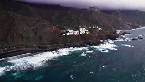 Aerial-of-green-epic-ocean-coast-town-in-Anaga-mountain,-Tenerife