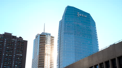 Time-lapse-of-the-sun-passing-between-downtown-skyscrapers-in-Denver,-Colorado