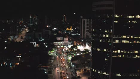 Victoria-Island,-Lagos-Nigeria--December-20-2022:-Cityscape-of-Victoria-Island-at-Night-time-with-traffic,-a-luxurious-business-and-residential-district-in-Lagos