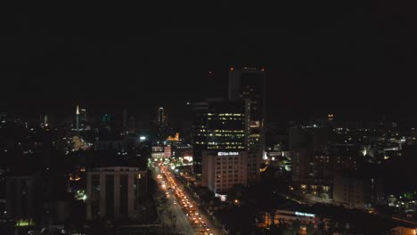 Victoria-Island,-Lagos-Nigeria--December-20-2022:-Cityscape-of-Victoria-Island-at-Night-time-with-traffic,-a-luxurious-business-and-residential-district-in-Lagos