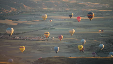Goreme,-Cappadocia,-Turkey,-Hot-Air-Balloons-Above-Scenic-Landscape,-Famous-Tourist-Attraction