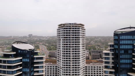 Aerial-drone-pull-back-from-the-Pearls-Residence-and-hotel-to-reveal-Umhlanga-main-beach-and-pier