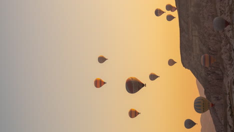 Vertical-4k-Timelapse,-Hot-Air-Balloons-Flying-Above-Cappadocia-at-Sunrise