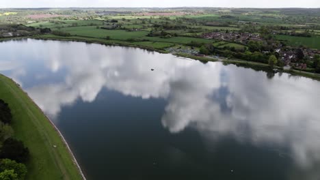 Small-Reservoir,-Clouds-Reflected-In-Water,-Man-Made-Lake,-Aerial-Landscape,-North-Warwickshire,-Shustoke