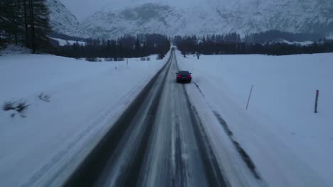 Car-on-a-long-snowy-road