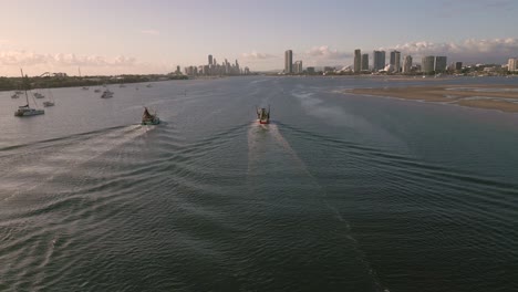 Aerial-view-over-the-Broadwater-on-the-Gold-Coast-moving-towards-Surfers-Paradise,-Queensland,-Australia