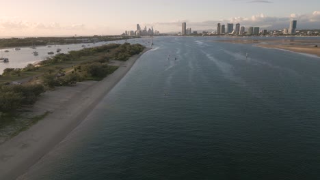 Aerial-view-over-the-Broadwater-on-the-Gold-Coast-moving-towards-Surfers-Paradise,-Queensland,-Australia