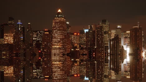 Day-To-Night-Time-Lapse-Of-Modern-City-Cityscape-Skyline-Apartment-High-Building-And-Skyscrapers-Water-Reflection-On-Lake