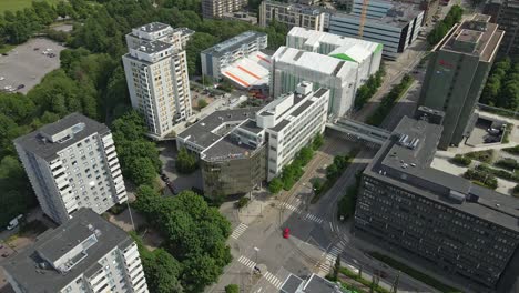 Aerial-view-of-apartment-and-office-buildings-in-Pasila,-Helsinki,-dolly-in