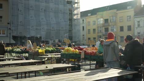 People-walking-through-the-Dolac-Market-in-Zagreb,-Croatia