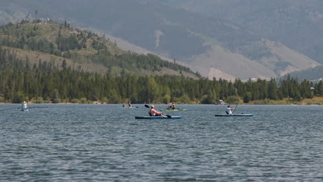 Kayakers-paddling-across-the-Dillon-Reservoir-in-Colorado's-Frisco-Adventure-Park