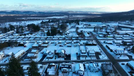Aerial-truck-shot-of-houses-covered-in-snow