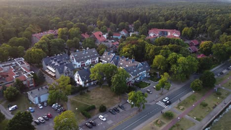 AERIAL-Fly-By-over-a-Resort-Town-Juodkrante,-Lithuania
