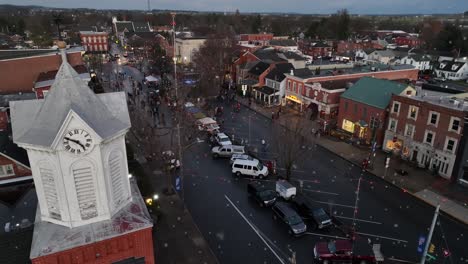 Aerial-reveal-of-Christmas-tree-lighting-ceremony-on-town-square