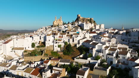 Olvera-Town,-White-Houses-In-Andalusia,-Spain---aerial-drone-shot