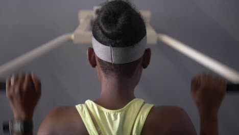 African-American-female-working-out-in-home-gym