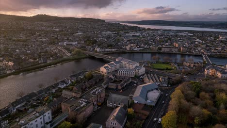 Timelapse-aerial-shot-overhead-Inverness-with-rush-hour-traffic-passing-,-drone-hyperlapse