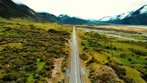 Mount-Cook-National-Park,-New-Zealand-Aerial-Drone-Pan-down-to-Road