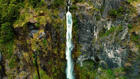 New-Zealand-Drone-Aerial-of-Devil’s-Punchbowl-Waterfall,-Camera-Hovers