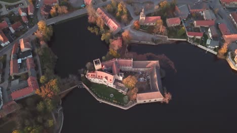 Stunning-top-down-aerial-view-of-the-architecture-of-Flechtingen-water-castle,-Wasserburg-Flechtingen,-Germany