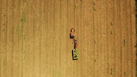 Agricultural-machines-working-in-farmland-during-harvesting