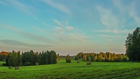 Timelapse-of-colourful-clouds-moving-in-blue-sky-over-rural-countryside